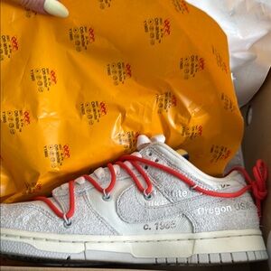 Nike Off-White Low Sneakers with Red Accents